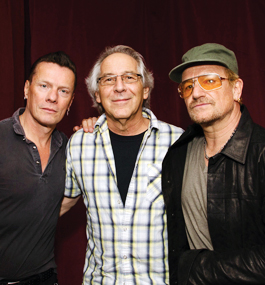 Norm Winer ’69 (center) with U2’s Larry Mullen Jr. and Bono 
